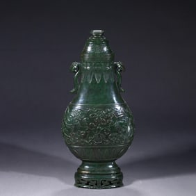 Carved green jade double-eared bottle