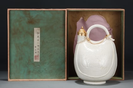 A Ding Ware Gilt Ewer