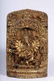 A Gilt Bronze Elephant-Trunk Deity Plaque