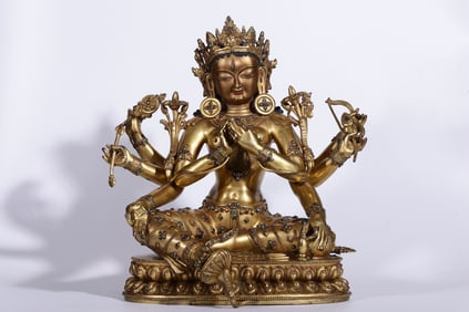 A Gilt Bronze Gem-Inlaid Ushnishavijaya Statue