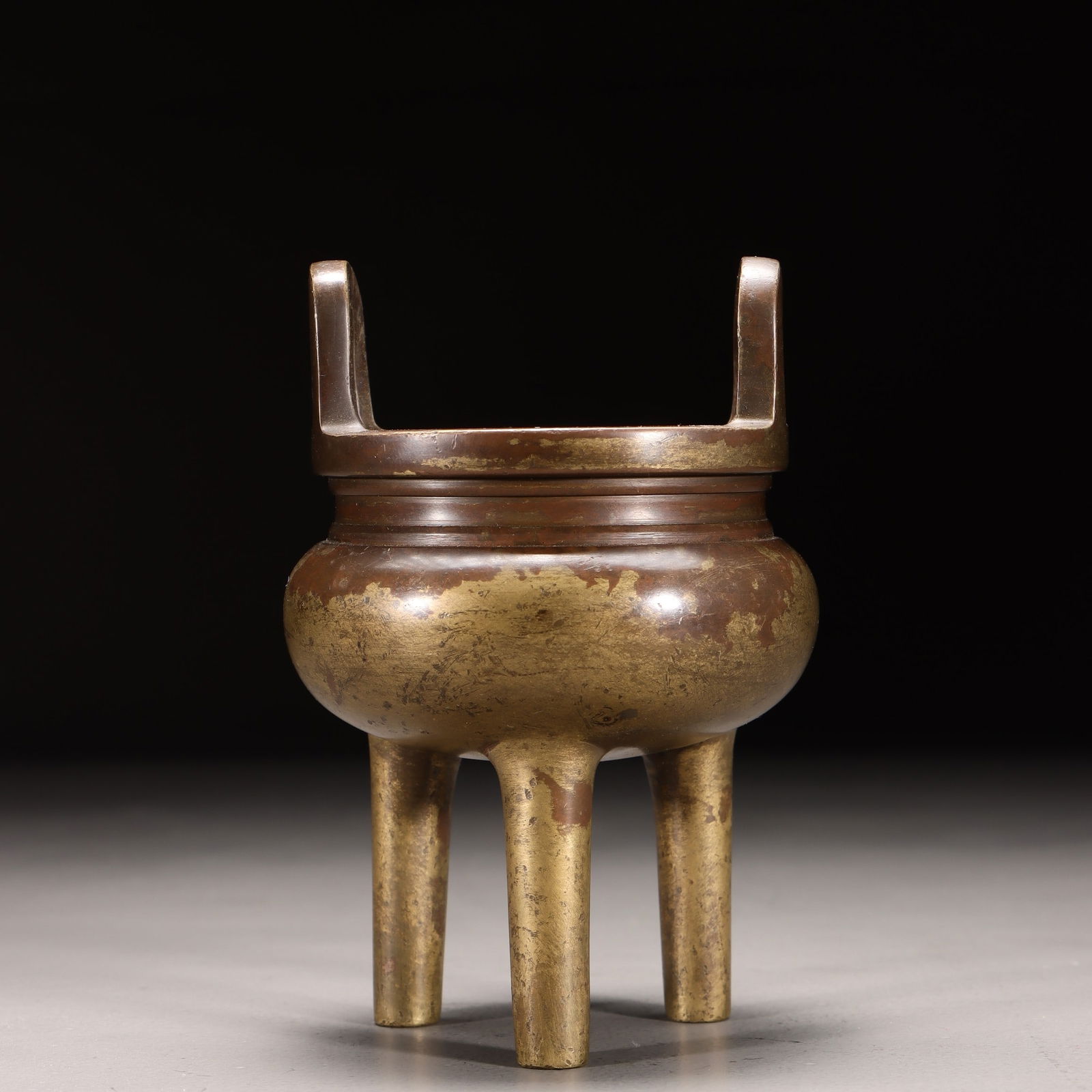 A Gilt Bronze Tripod Censer: A Gilt Bronze Tripod Censer. Height: 4.13in; Diameter: 2.01in; Diameter: 2.76in.