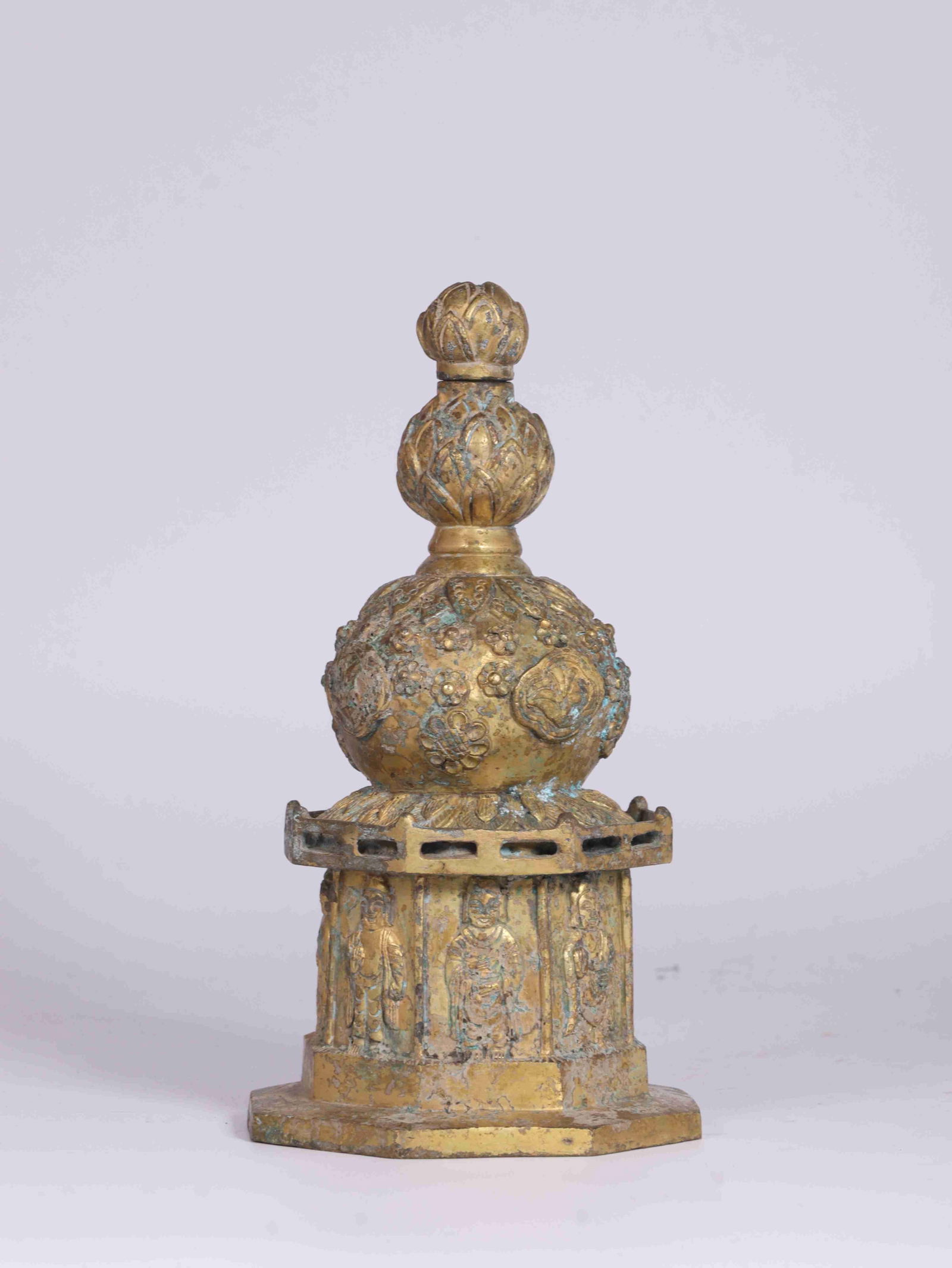 A Gilt Bronze Stupa: A Gilt Bronze Stupa. Height: 7.87in; Width: 3.94in.
