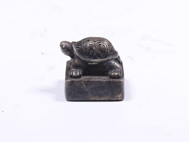 A Silver Seal With Turtle Knob