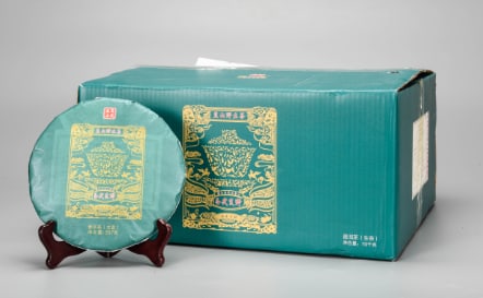 A Group of Twenty-Eight Pu’er Tea Cakes