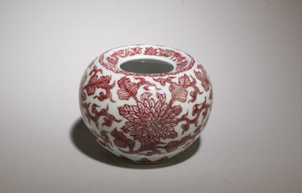 An Iron-Red Water Dropper