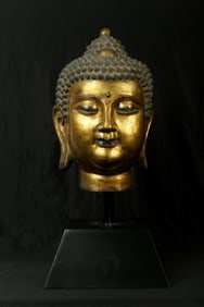 A Gilt Bronze Buddha Head