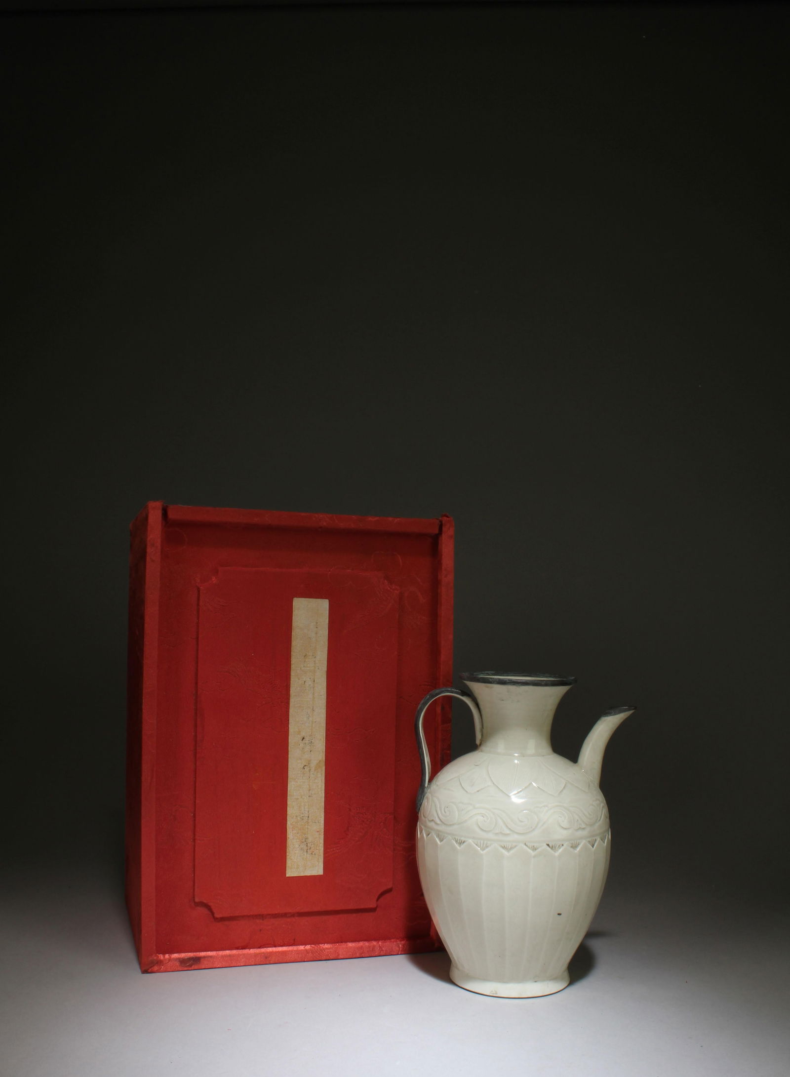 A Ding Ware Pot: A Ding Ware Pot. Comes with a box. Height: 18cm Diameter: 12cm