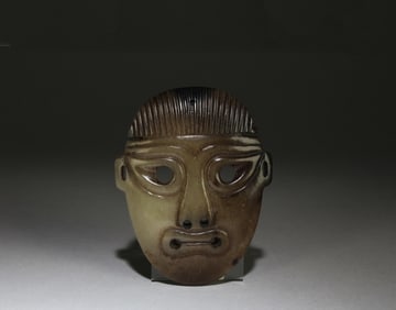 A Carved Jade Facemask