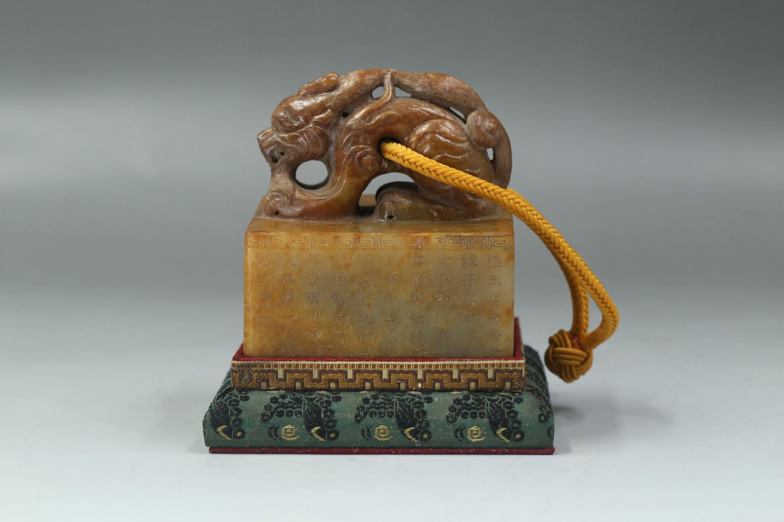 Antique Carved Jade Seal: Antique Jade Seal, with a carved mythical beast finial top. Comes fitted with a base. Height: 3.94in. Length: 3.35in.