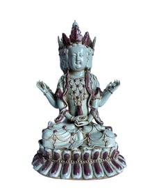 An Iron Red Seated Guanyin Statue