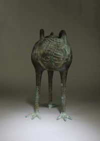 A Bronze Tripod Container