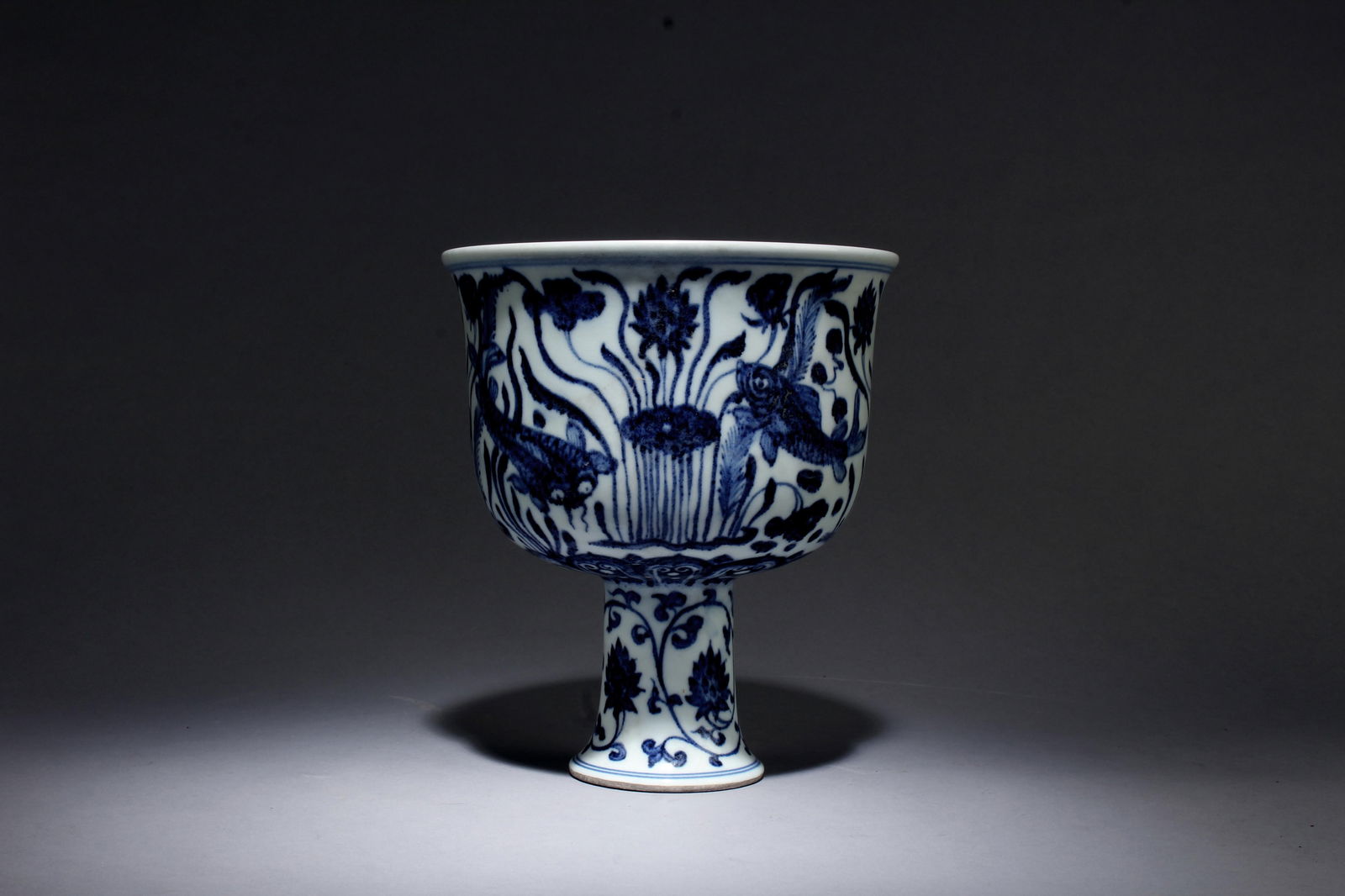 A Blue and White Stem Cup: A Blue and White Stem Cup. Dimensions: 8" x 6.8".
