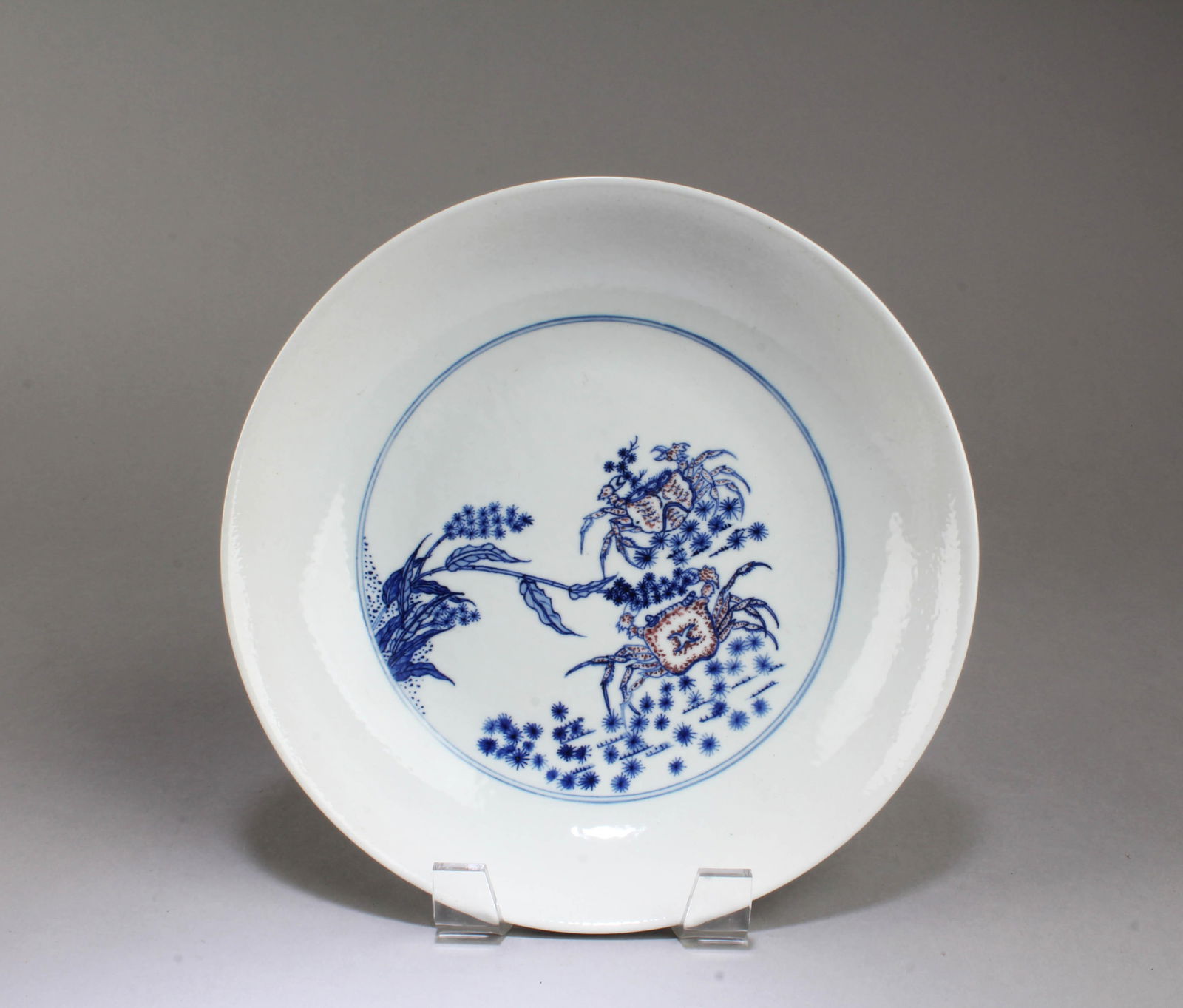 Chinese Iron Red Blue & White Porcelain Plate: ChineseIron Red Blue & White Porcelain Plate. 'YongZheng' mark at base. Diameter: 8.6"