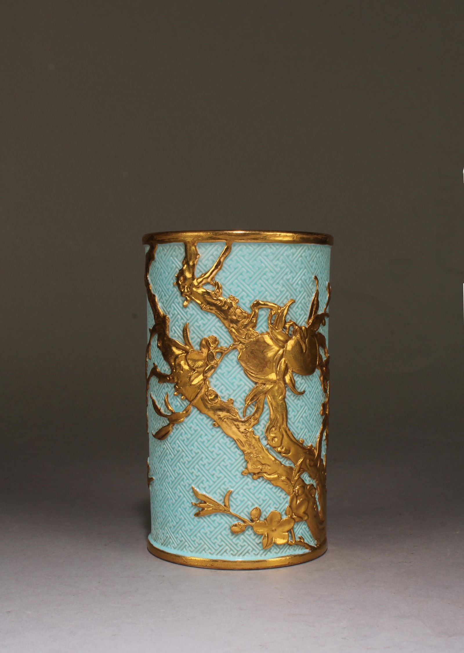 A Porcelain Brushpot: A Porcelain Brushpot. 'QianLong' mark at base. Diameter: 3" Height: 5"