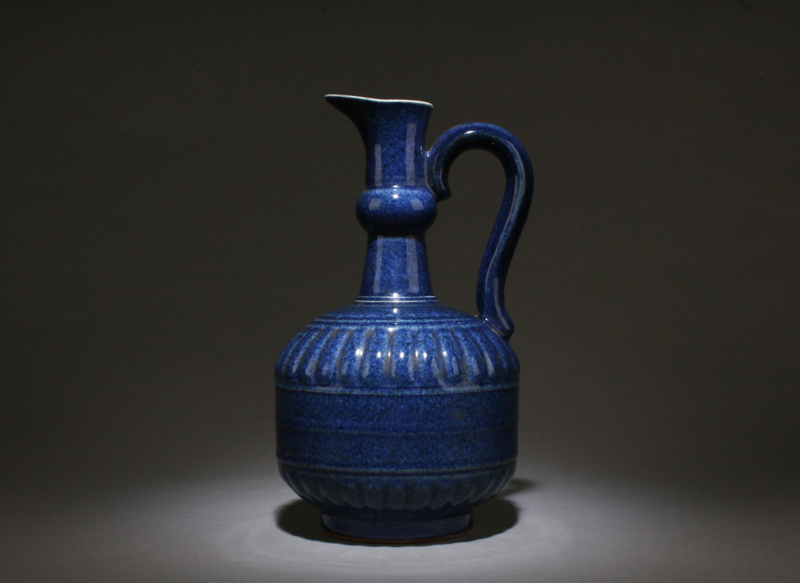 A Chinese Watering Pot: A Chinese Watering Pot. "XuanDe" mark at base. Height: 11" ; Diameter: 6.5"