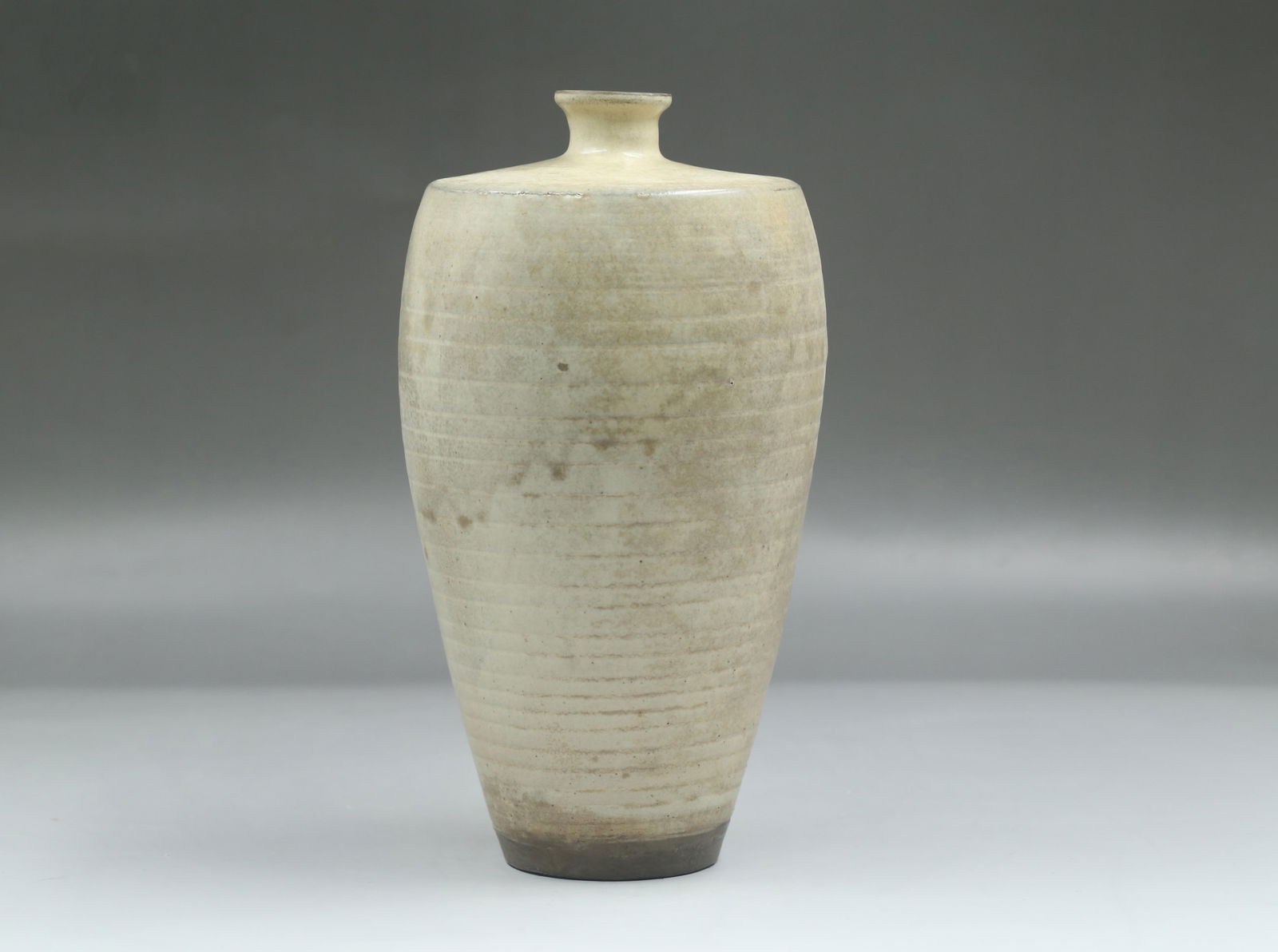 A Pottery Vase: A Pottery Vase. Diameter: 6.25" Height: 11"