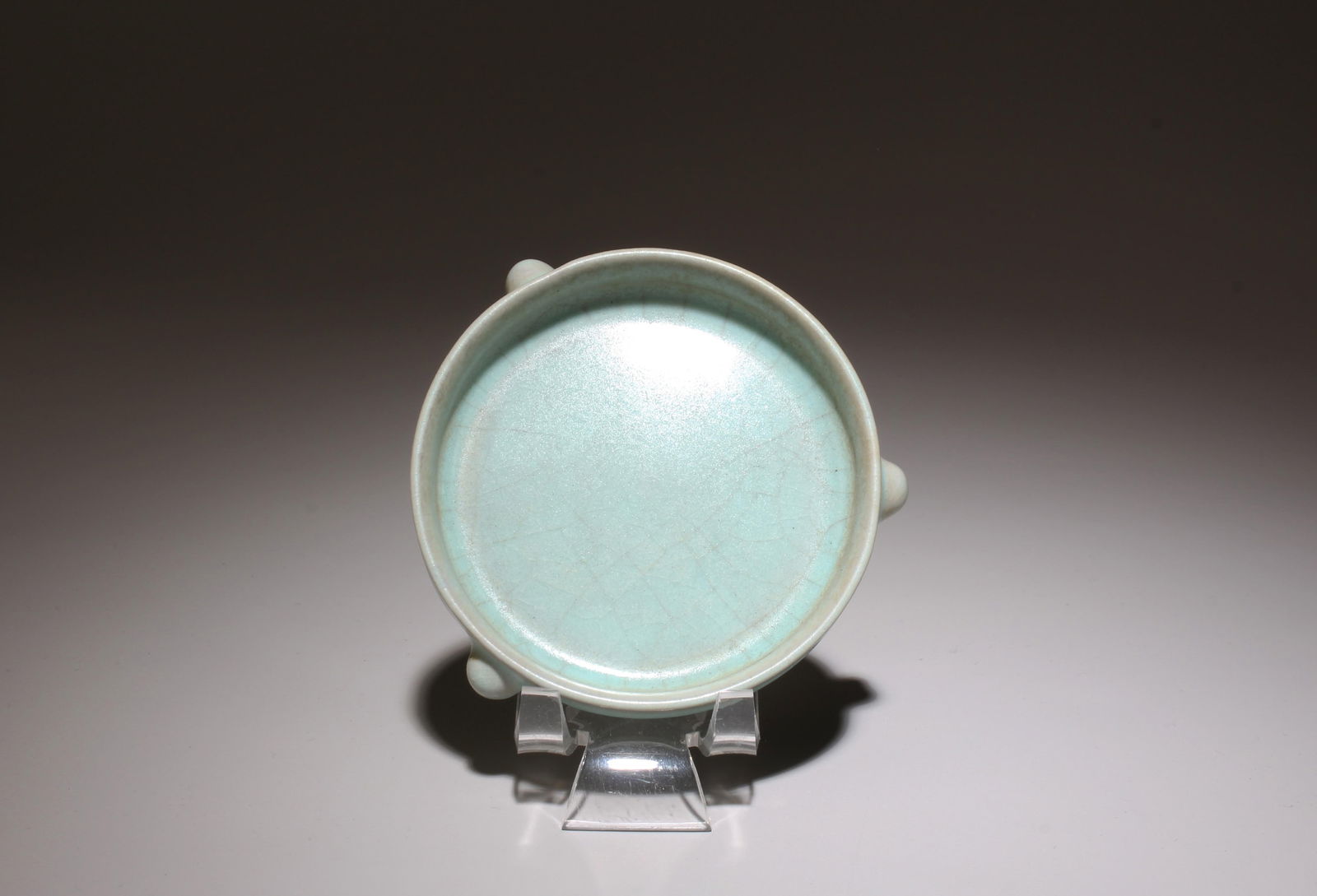 A Ruyao Ink Washer: A Ruyao Ink Washer. Dimensions: 3.25" x 1".