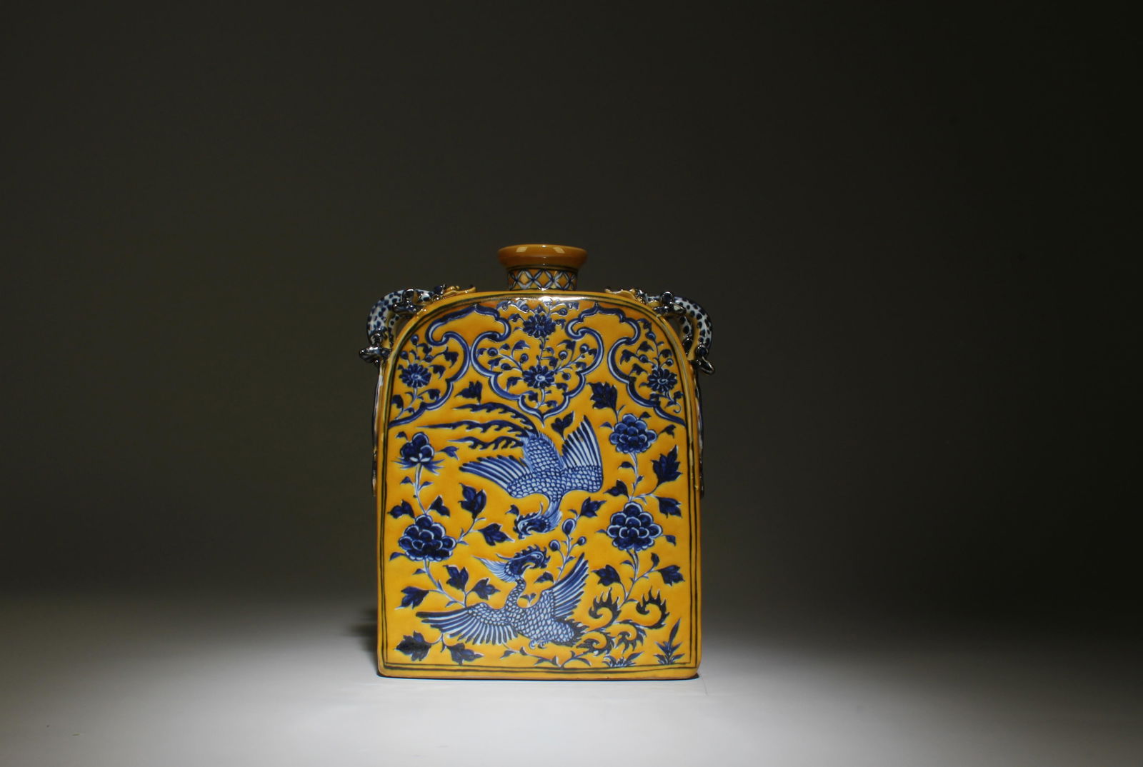 A Blue and Yellow Vase with Phoenix Motif: A Blue and Yellow Vase with Phoenix Motif. Dimensions: 6.6" x 9.3".