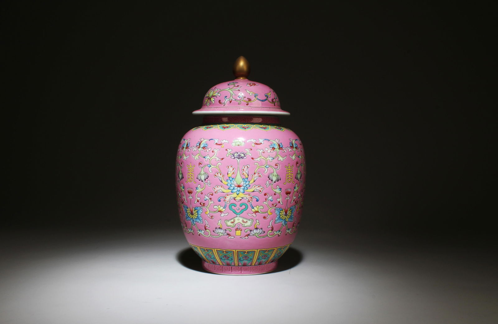 A Fencai Jar with Lid: A Fencai Jar with Lid. Dimensions: 5.5" x 9".