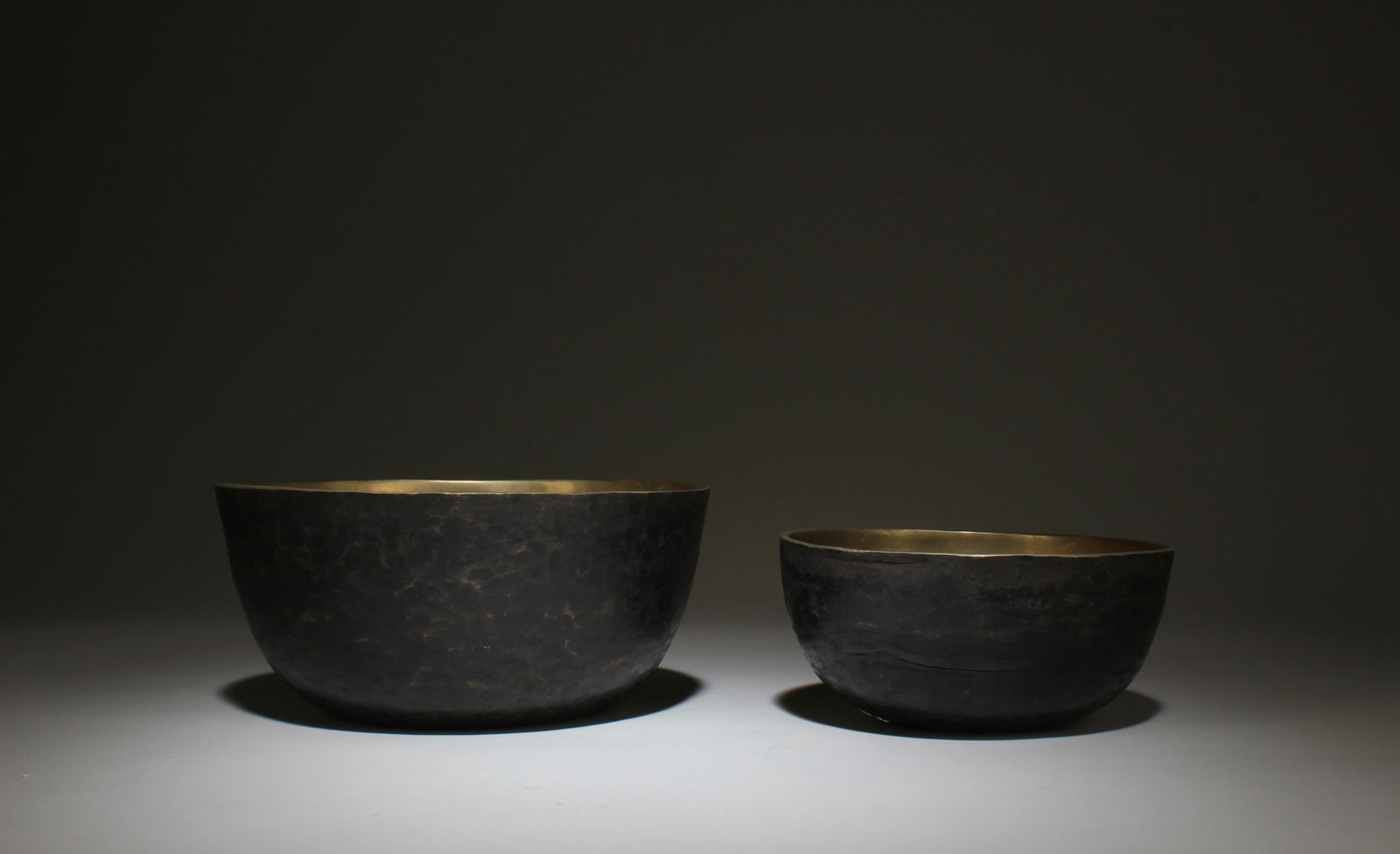 A Set of Two Bronze Buddha Ornaments for Rituals: A Set of Two Bronze Buddha Ornaments for Rituals. Dimensions: 7" x 3.3" (Bigger). Dimensions: 5.5" x 2.4"(smaller).