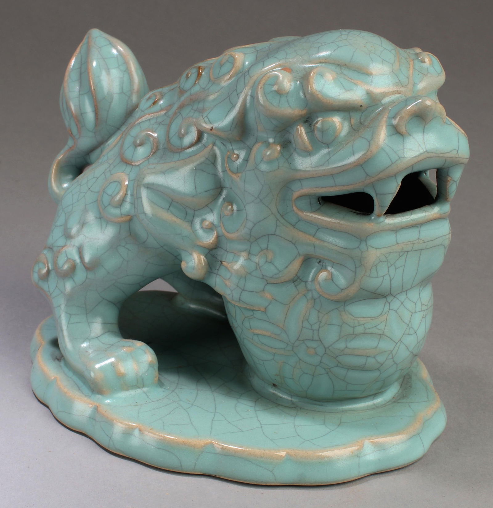 A Chinese Crackleware Mythical Beast Statue: Chinese Crackleware Porcelain Mythical Beast statue. Length: 5.25"