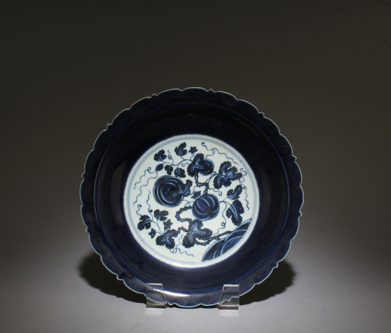 A Blue and White Plate: A Blue and White Plate. Dimensions: 8.75" x 2".