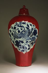 A Blue, White, and Red Vase with Lid