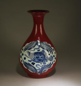 A Blue, White, and Red Vase with Lid