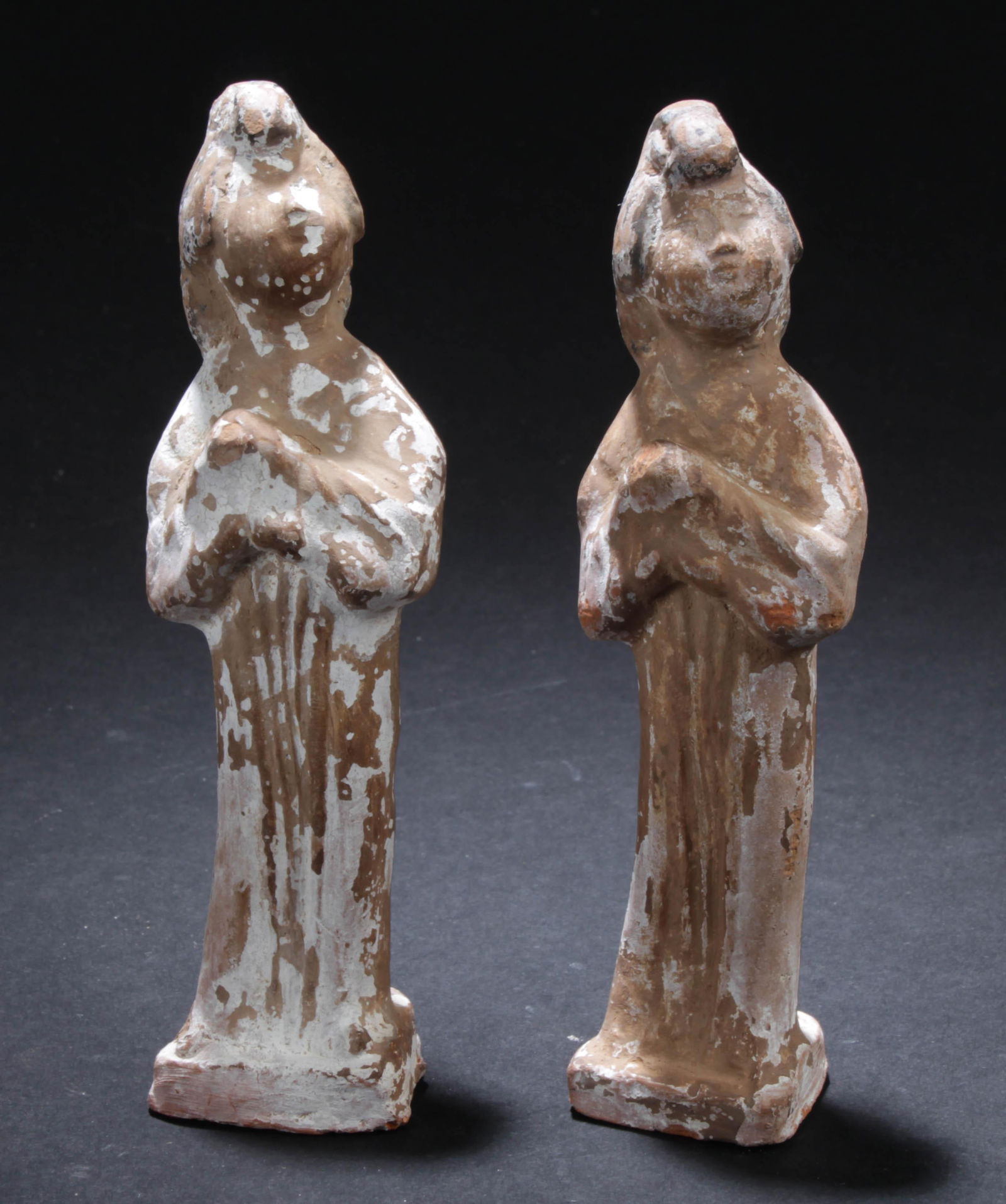 A Set of Two Carved Statues: A Set of Two Carved Statues. Height: 3"