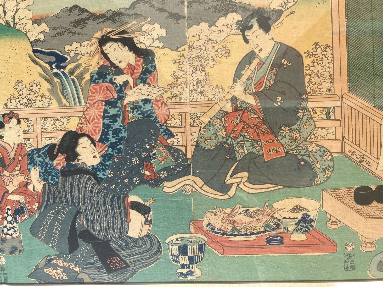 A Japanese Wood Block Print: A Japanese Wood Block Print. Frame Dimensions: 35.2''x20.2''