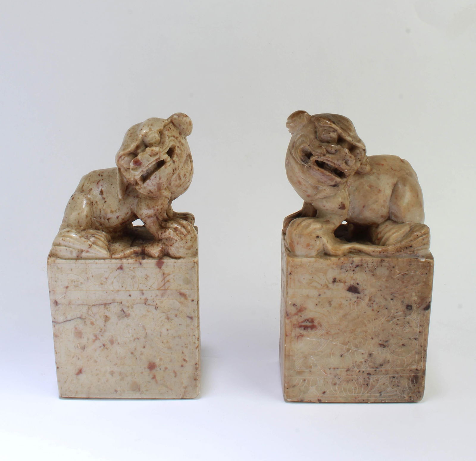 A Pair of Carved Stone Carving: A Pair of Carved Stone Carving. Height: 4.5"