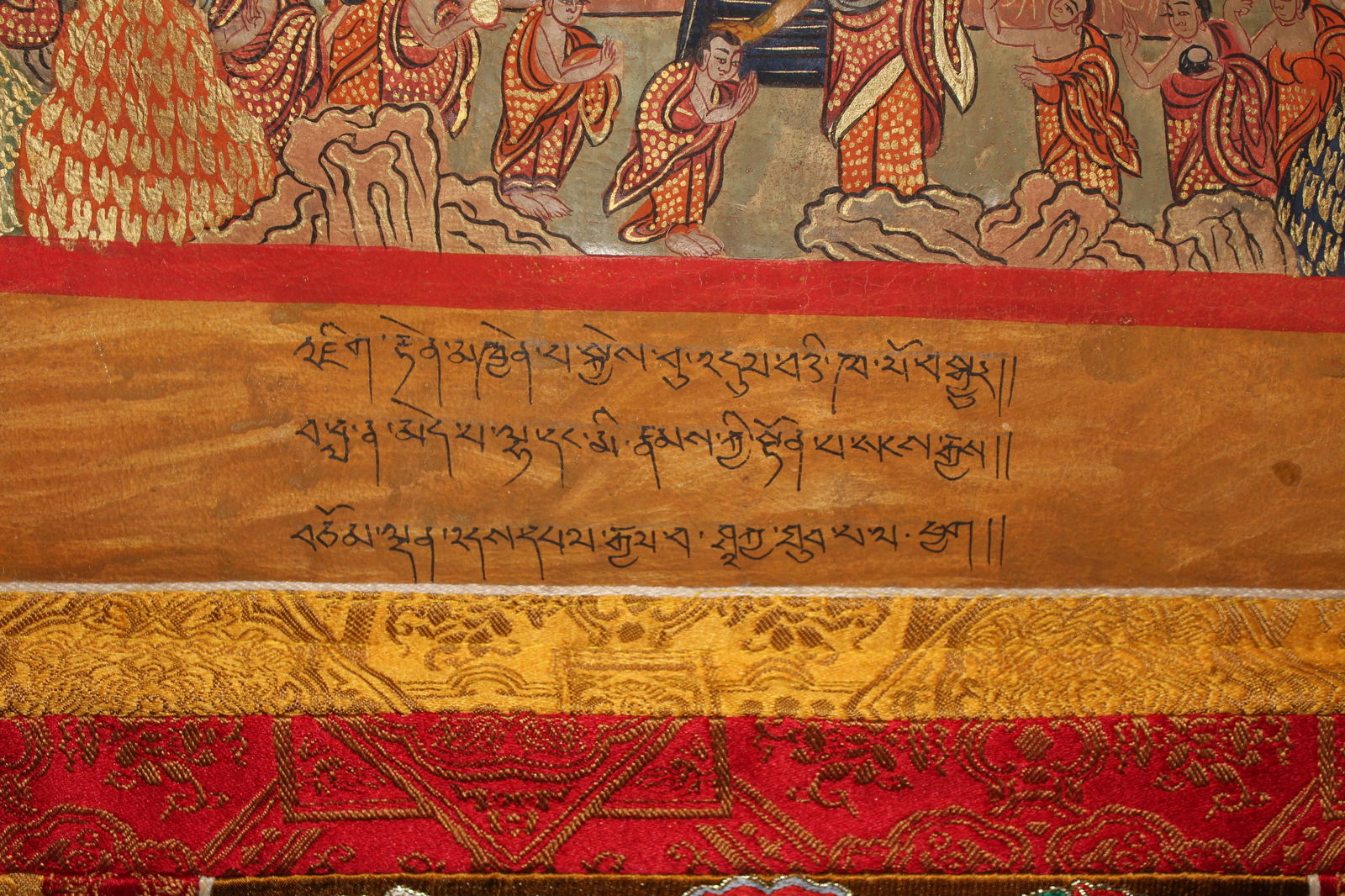 A Tibetan Thangka: A Tibetan Thangka. Outer Dimension: 71" x 36", Inner Dimension: 24" x 34".