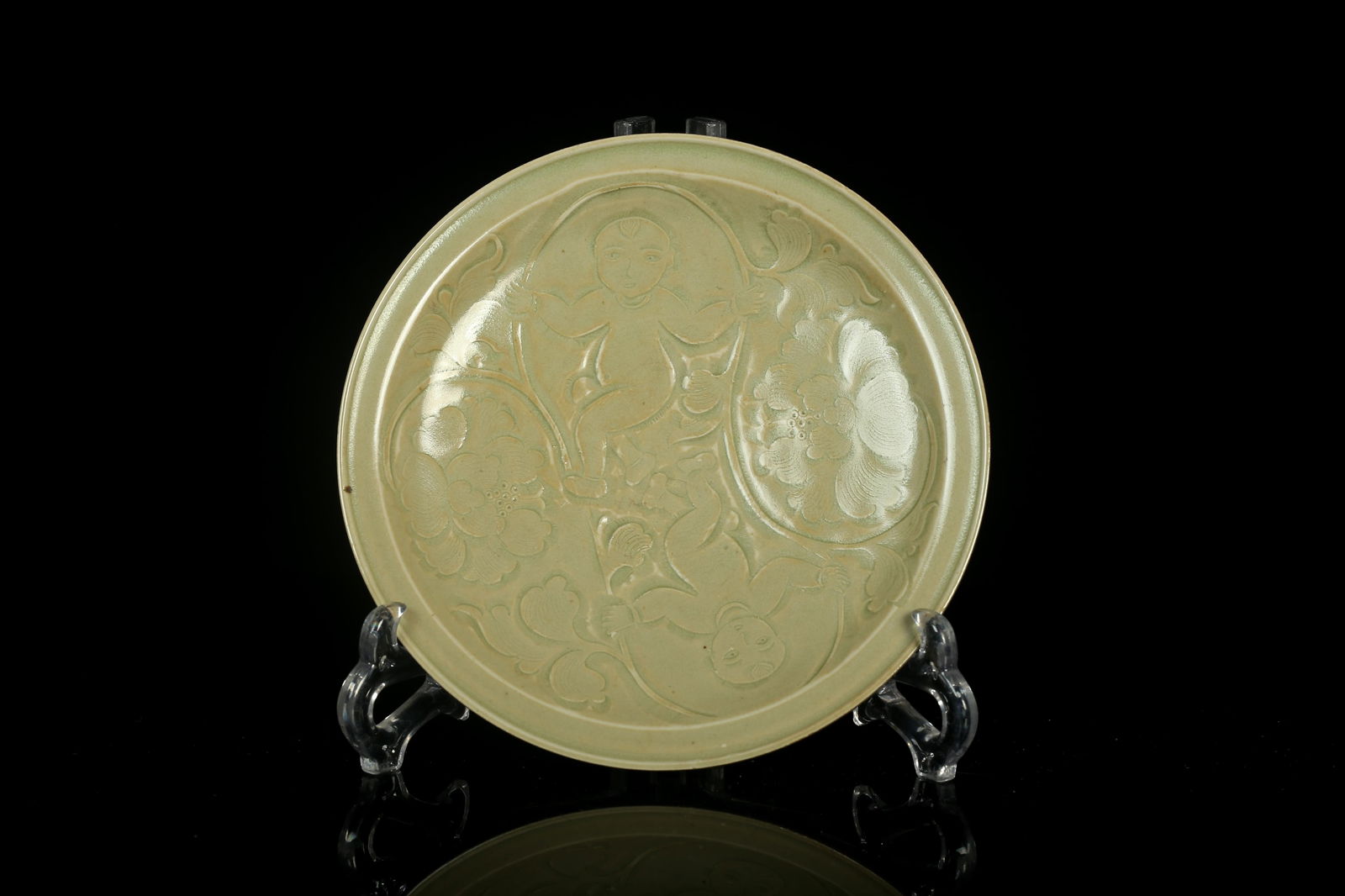 A Yaozhou Plate: A Yaozhou Plate. Height: 1" Diameter: 7.5"
