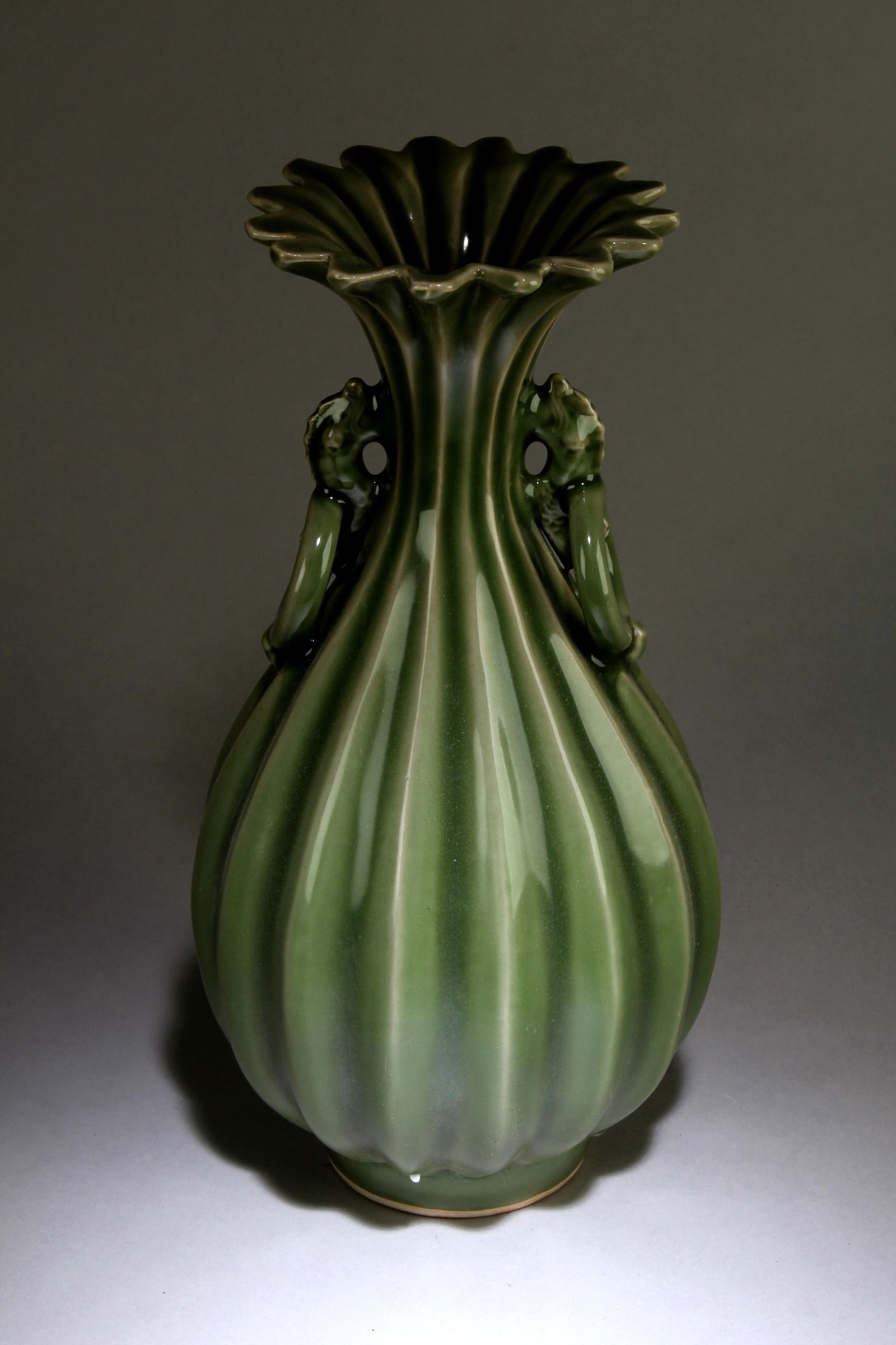 A Chinese LongQuan Vase: A Chinese LongQuan Vase. Dimensions: 13.3" x 6.5".