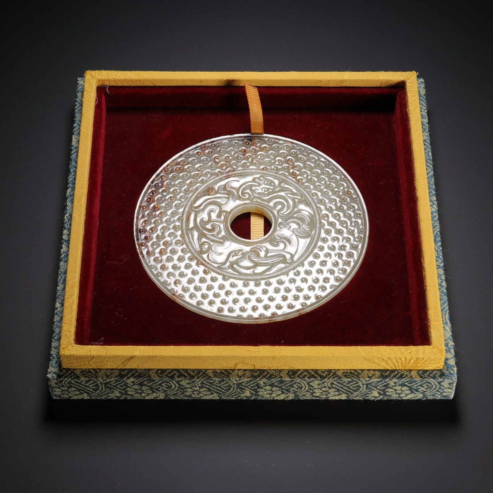 A Jade Bi: A Jade Bi. Diameter: 4.53in; Weight: 0.265lb.