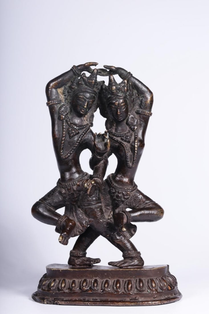 A Bronze Guanyin Statue: A Bronze Guanyin Statue. Height: 6.30in; Length: 4.13in; Width: 1.57in; Weight: 1.898lb.