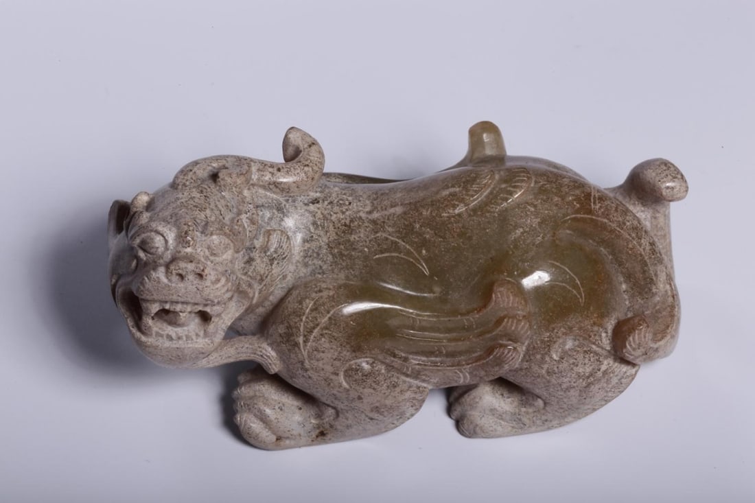 A Jade Tianlu Ornament: A Jade Tianlu Ornament. Height: 1.97in; Length: 4.13in; Width: 1.97in; Weight: 0.635lb.