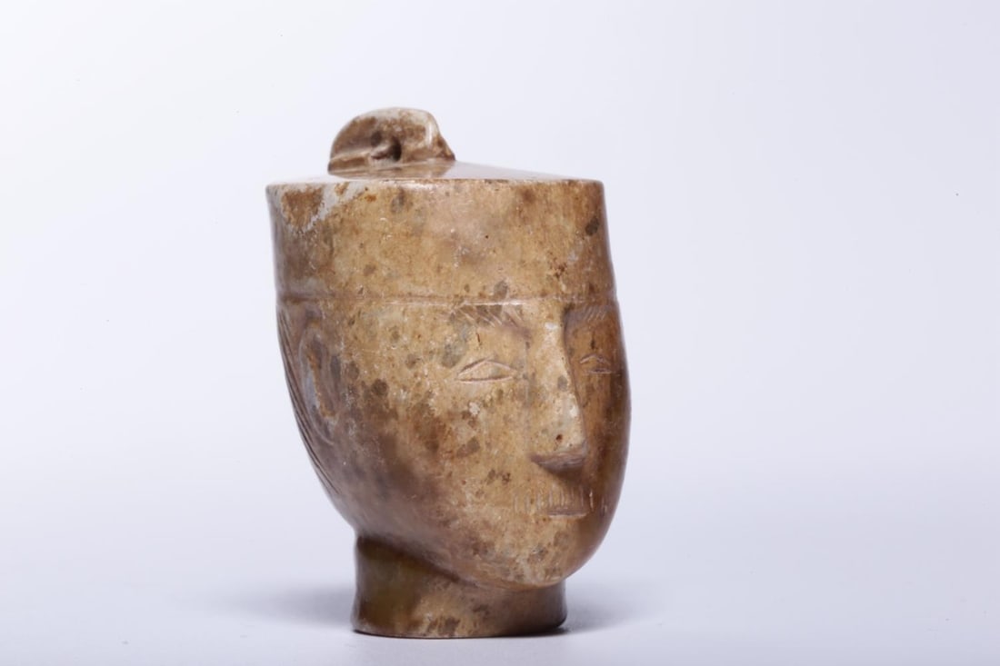 A Jade Ornament: A Jade Ornament. Height: 1.57in; Length: 1.26in; Width: 0.98in; Weight: 0.101lb.