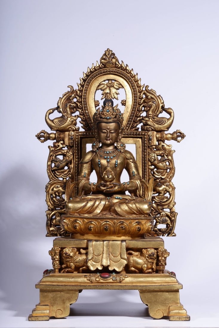 A Gilt Bronze Buddha Statue: A Gilt Bronze Buddha Statue. Height: 15.75in; Length: 8.27in; Width: 7.68in; Weight: 18.040lb.