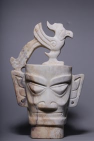 A Jade Figure with Bird Ornament