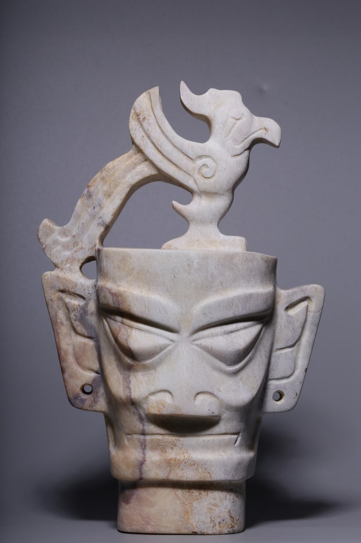 A Jade Figure with Bird Ornament (1 of 9)