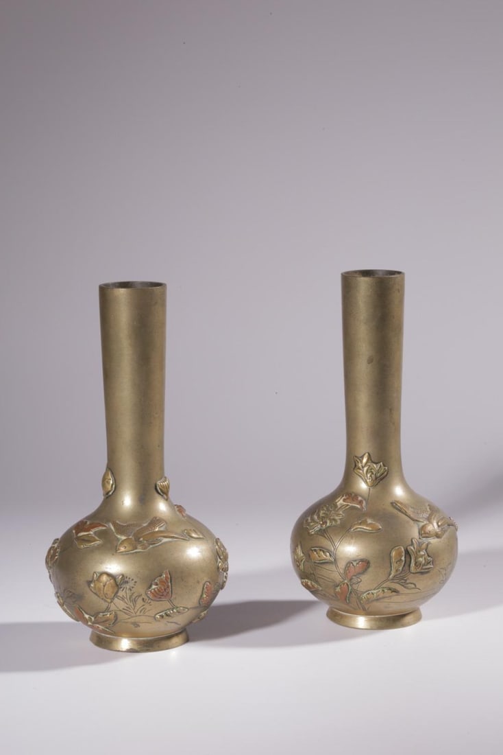 A Pair of Bronze Vases: A Pair of Bronze Vases. Height: 5.71in; Diameter: 2.76in; Weight: 0.569lb.