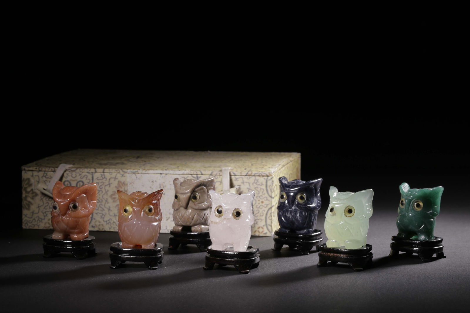A Set of Seven Stone Owl Ornaments (1 of 9)