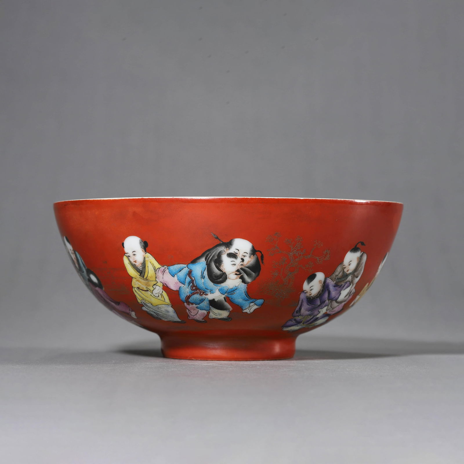 Coral-Red Glaze Boy Playing Bowl: Coral-Red Glaze Boy Playing Bowl. Diam: 7.28" Height: 3.15"