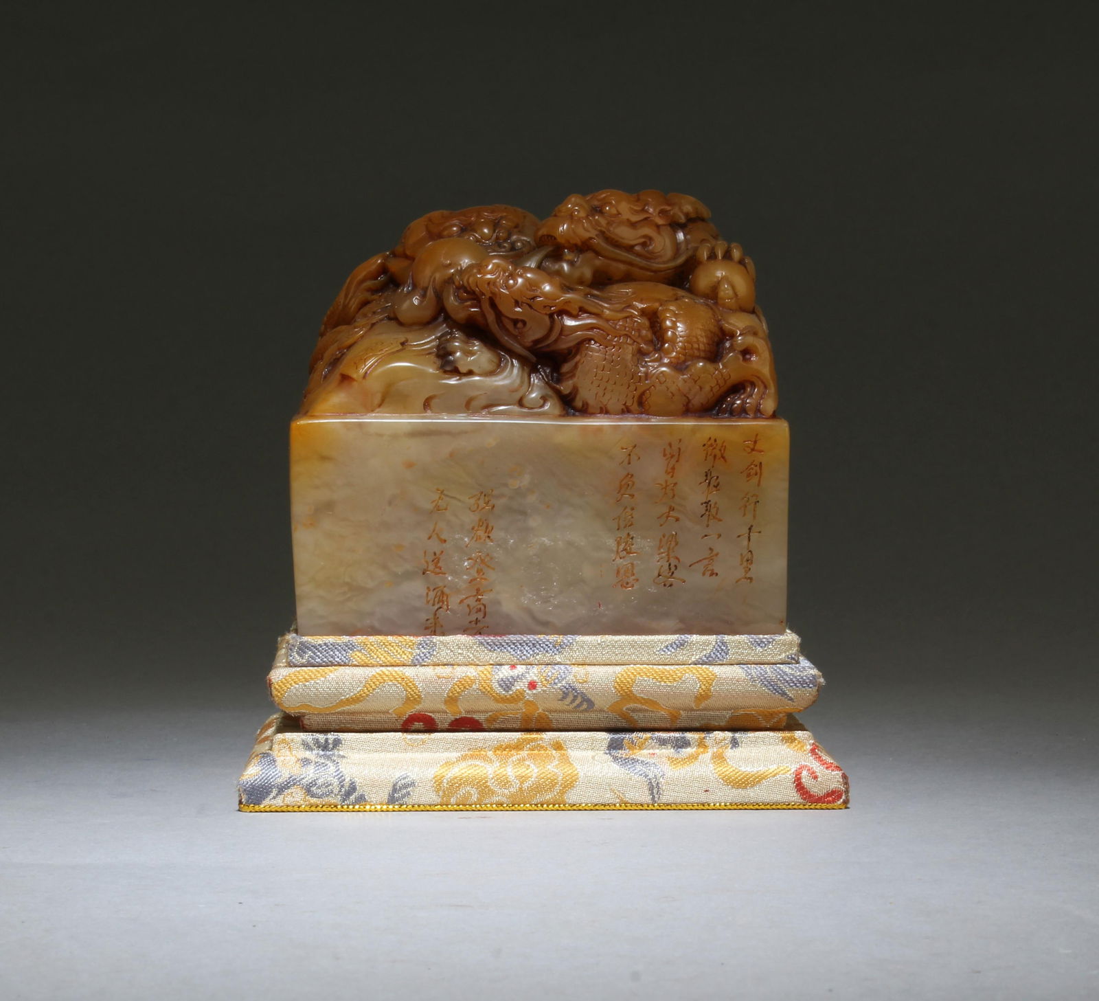 A Carved Soapstone Seal: A Carved Soapstone Seal. Comes fitted with a base. Height: 3.25"