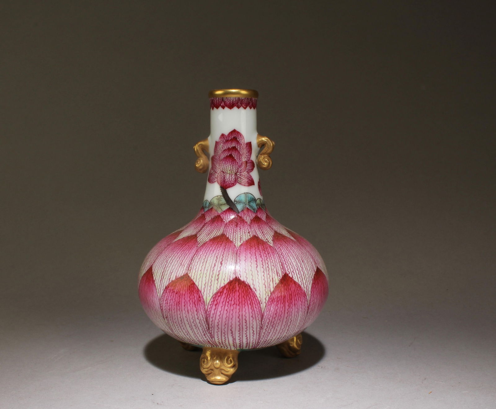 A Lotus Flower Bottle Base with Gilt Accents: A Lotus Flower Bottle Base with Gilt Accents. Dimensions: 6" x 4.2".