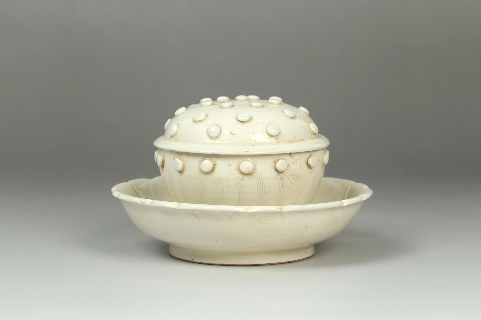 A Dingyao Cup with Saucer (1 of 4)