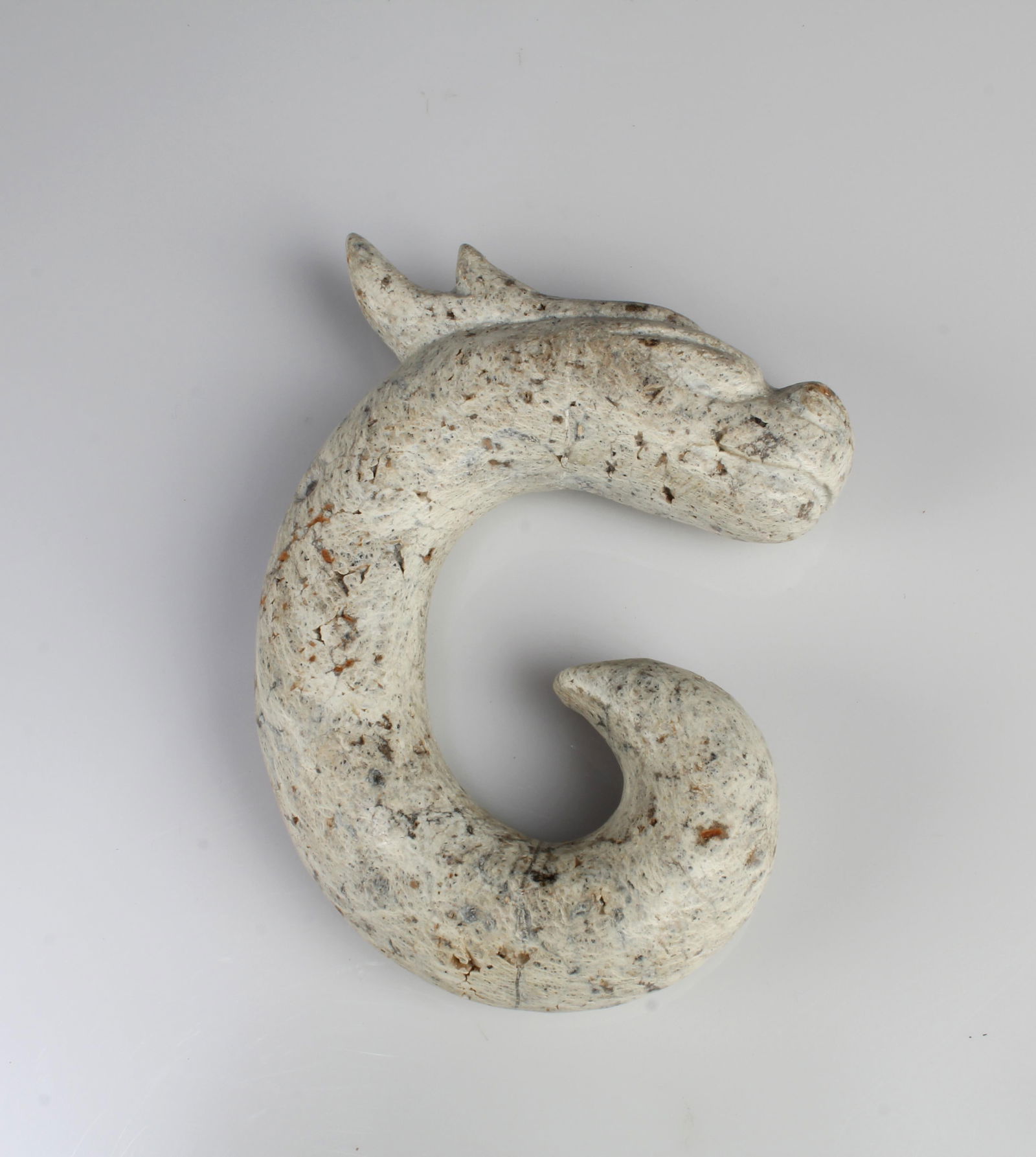 A Carved Dragon Jade Ornament: A Carved Dragon Jade Ornament. Length: 4.25"