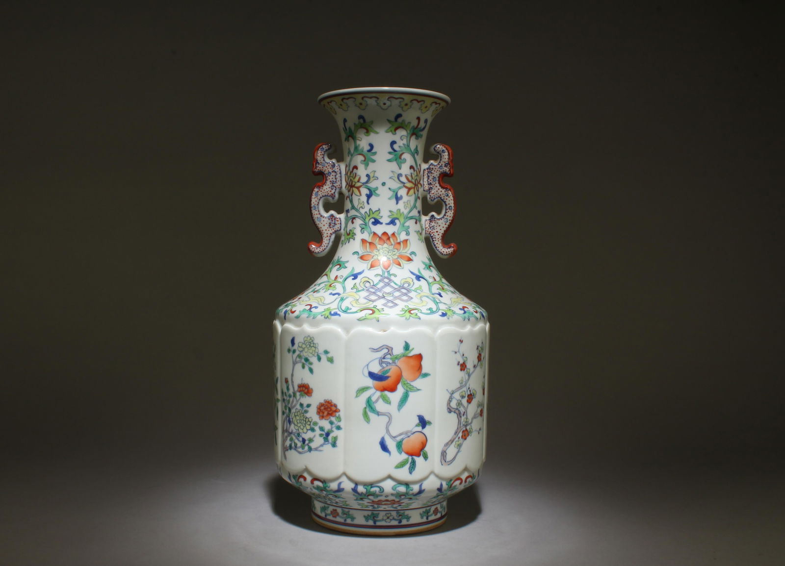 A Double-Eared Doucai Vase with Peach Motif: A Double-Eared Doucai Vase with Peach Motif. Dimensions: 14.5" x 7".