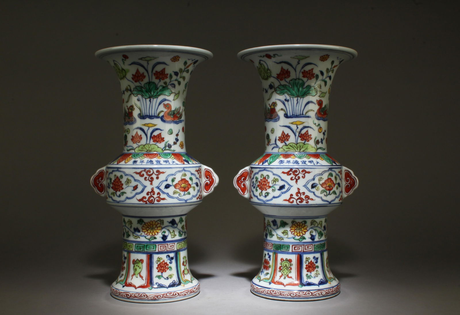 A Pair of Doucai Vases: A Pair of Doucai Vases. Dimensions: 12" x 6.75".